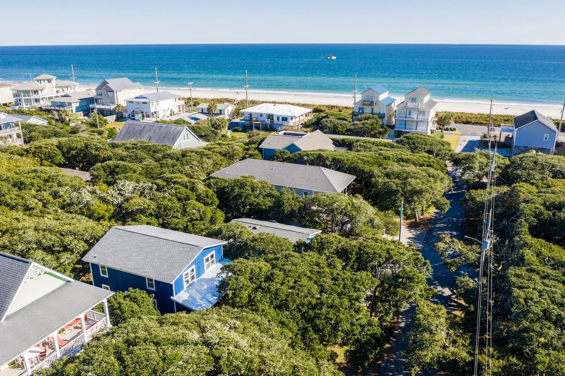 Aerial of the Sound to Sea beach house with the Atlantic Ocean just behind it on Topsail Island
